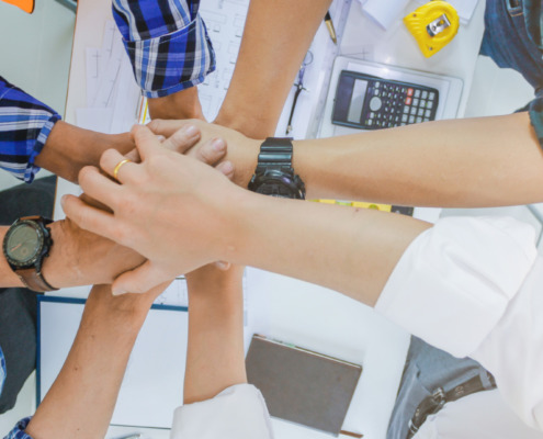 Soft Focus, Soft Light,A team of engineers and investors join hands to start residential real estate project. Businessmen and investors join hands with team of engineers to start real estate project.