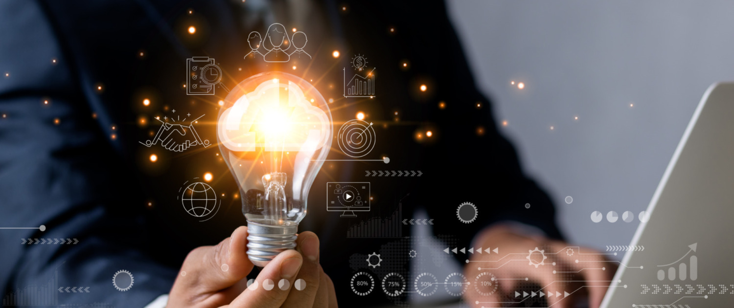 Hand holding light bulb with cloud computing icon and global internet connection technology. Internet Connectivity, Finance and Banking. Global Business and Digital Marketing, digital link technology.